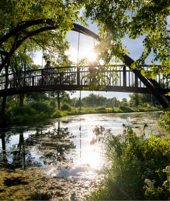 An image of the bridge that goes over the Yahara River at Tenney Park.