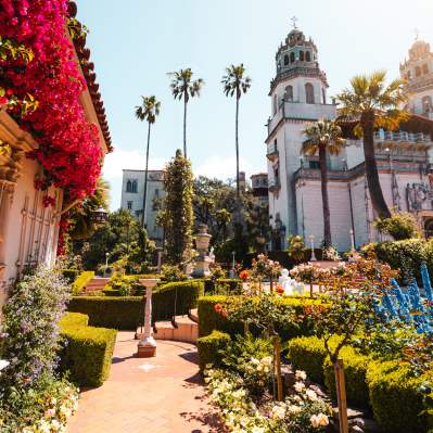 Exterior of Hearst Castle with plants in the foreground