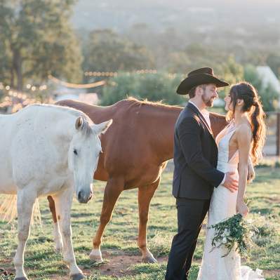 Wedding Couple on a Ranch with Horses