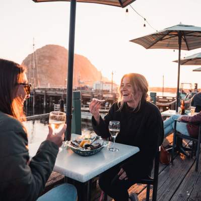 Girls Enjoying Wine and Seafood in Morro Bay