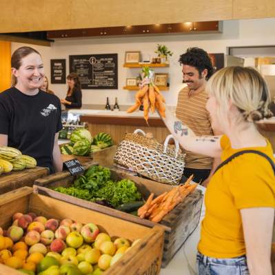 couple shopping for produce in SLO CAL