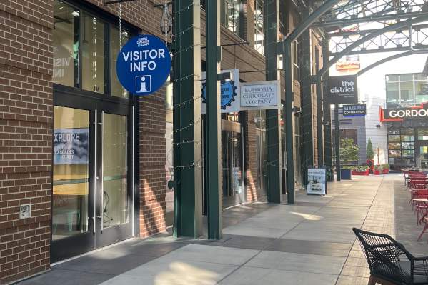 The store front of the Visitor Info center with signage.