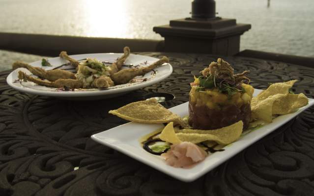 Two gourmet dishes at The Captain's Table Restaurant at Sunset