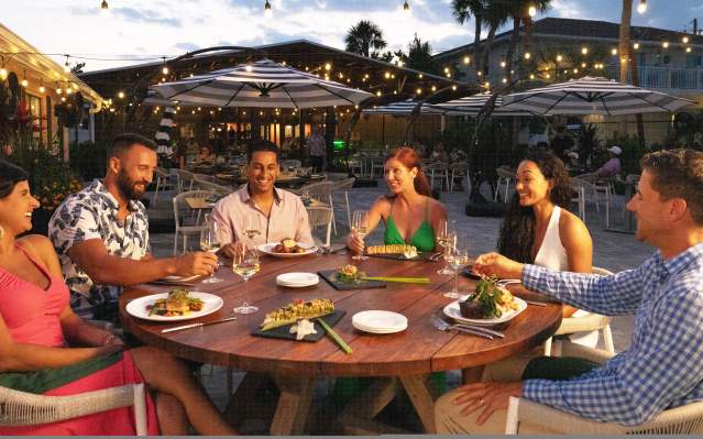 Group Dining outside at Magnolias on the Bay in Englewood, Florida