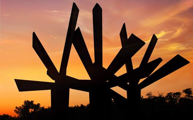 "Steel Palm" at sunset, at Peace River Botanical and Sculpture Gardens in Punta Gorda/Englewood Beach