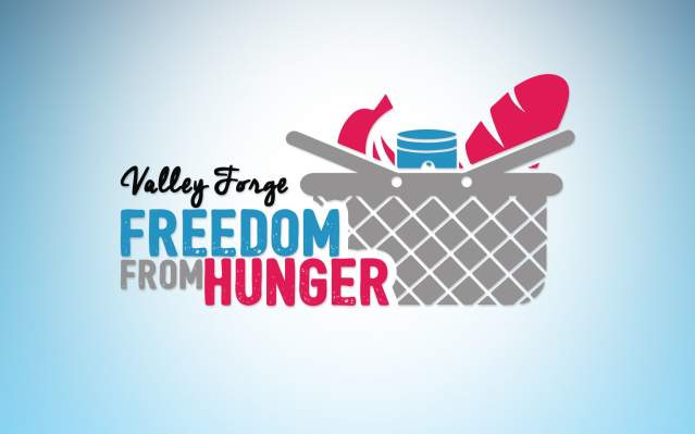 Valley Forge Freedom from Hunger multicolored logo featuring a grocery basket with a canned good and bread. Background color is gradient blue.