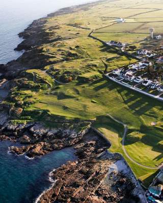 Aerial view overlooking the rocks and sea by the Ardglass Golf Club