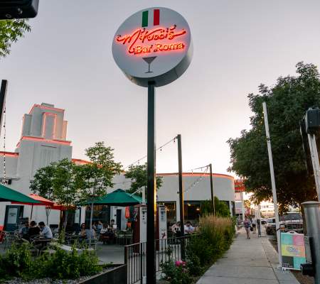 The neon sign of M'Tucci's Bar Roma