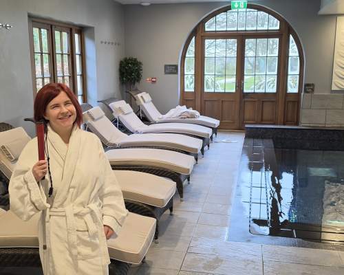Sassy standing in the Elan Spa in a robe, at Mallory Court Hotel and Spa