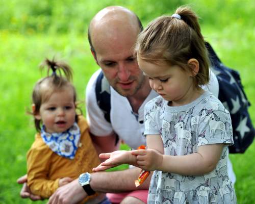 Children in the Cotswolds with a ladybird
