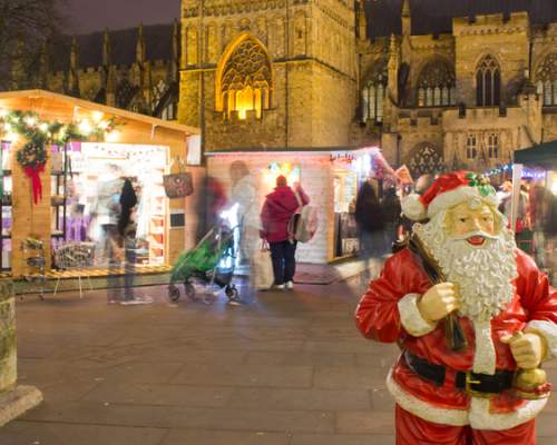 image shows christmas market at exeter cathedral