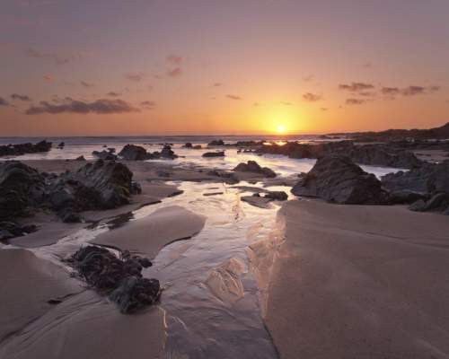 sunset over hartland beach