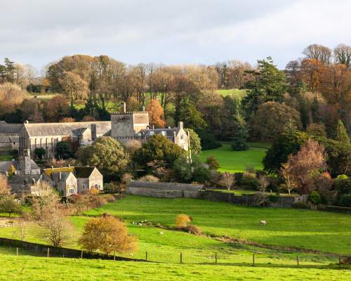 Buckland Abbey in the autumn amongst the trees