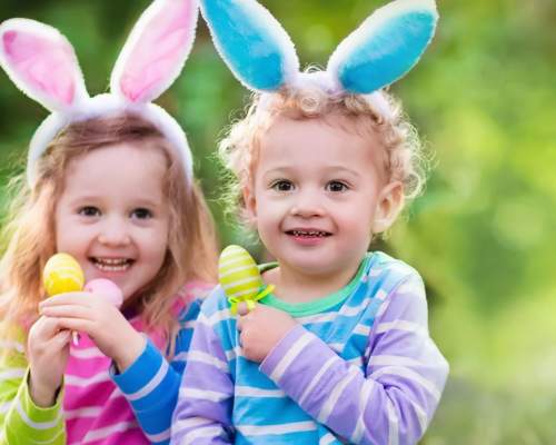 two children with easter eggs