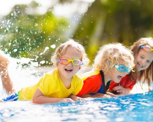 children playing in pool