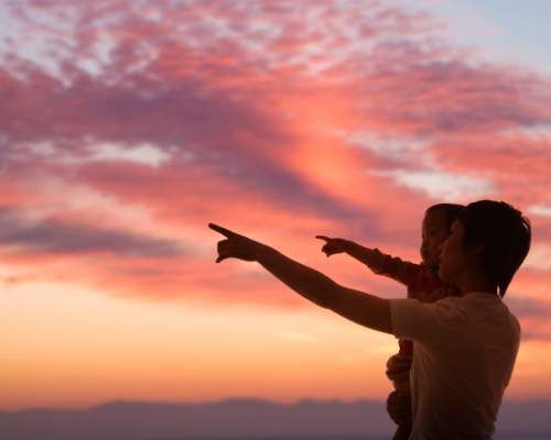 mother and child against sky