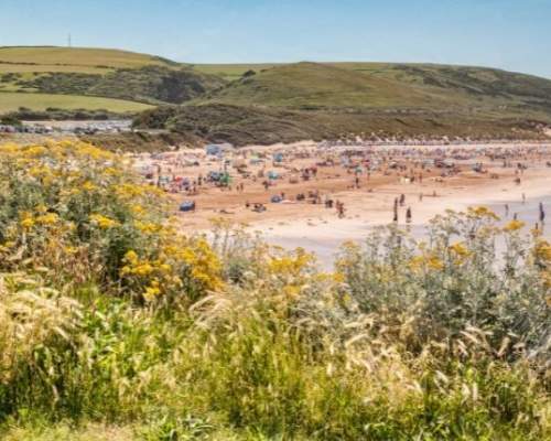 image shows the beach at woolacombe