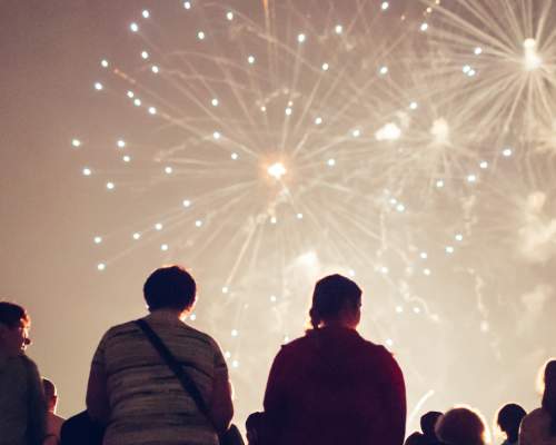 People looking up at the sky as a huge fireworks display takes place in East Yorkshire