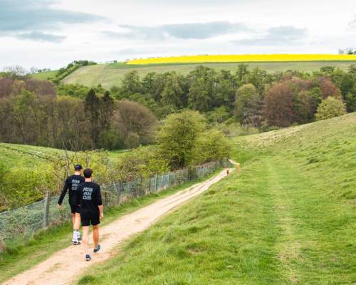 Two members of the ALTUS running club taking part in a trails run in the Yorkshire Wolds.