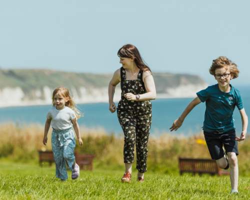 A mother and her two children on the cliff tops along the East Yorkshire coast