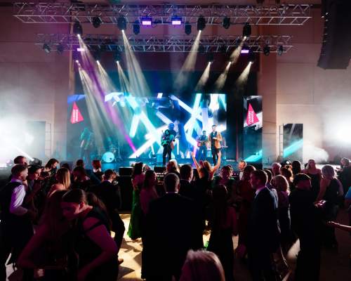 Entertainment on the stage at the REYTAs 2024 at Brid Spa with guests dancing on the dance floor