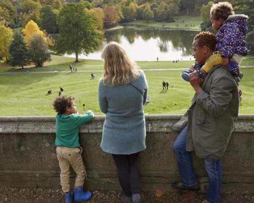 A family enjoying Claremont Landscape Garden, Surrey - Copyright National Trust Images.Arnhel de Serra
