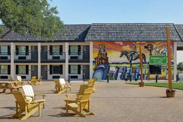 exterior shot of mural with amarillo icons on the atrea inn