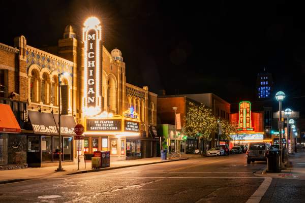 Lights on marquee of Michigan Theater at night