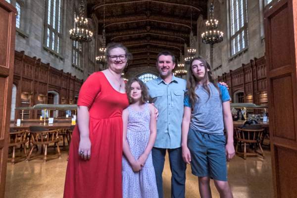 St. Clair family standing in Law library