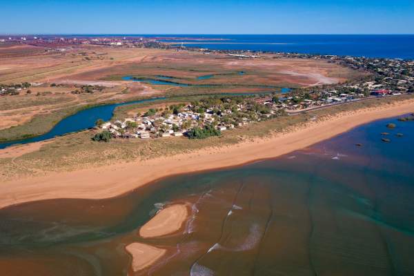 Seen from the air, the foreshore of Port Hedland with the port in the background