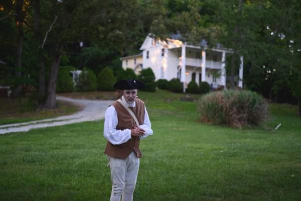 Actor portraying Enoch Pugh as a ghost from the past during a historic ghost tour in Hillsborough