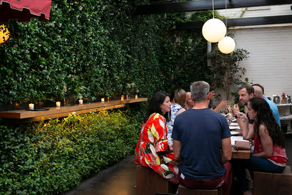 People gathered at a table for a private event at the Lantern Restaurant