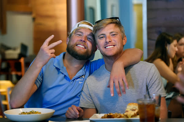 Two people enjoying lunch at the Carolina Brewery