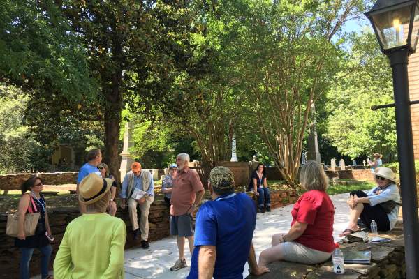 People with tour guide on walking tour in Hillsborough