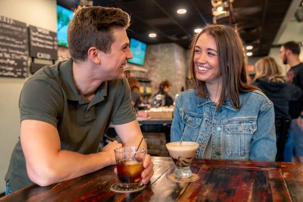 Couple drinking at Midstate Distillery