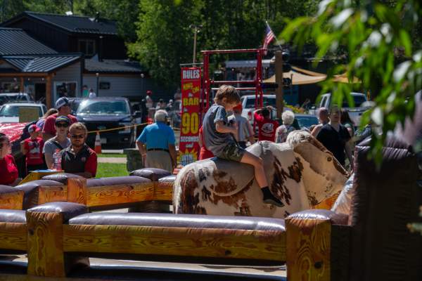 Buffalo Days - child on bull ride