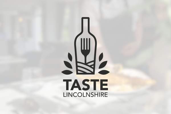 The Taste Lincolnshire logo overlaying a blurred image of a waiter serving food to a table.