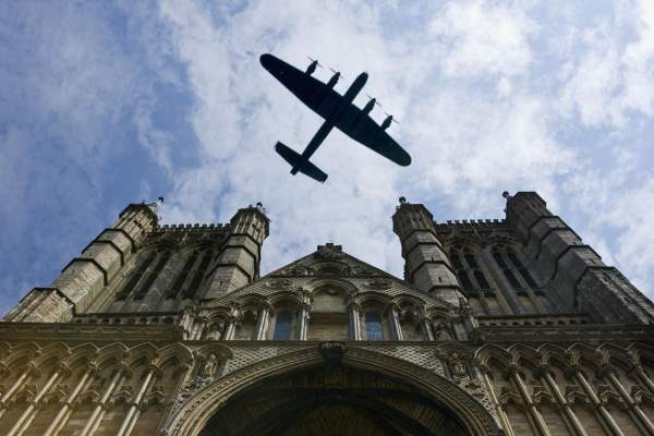 Aviation Lancaster Flyover Lincoln Cathedral with blue skies