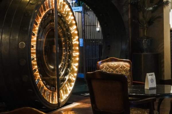 Lighted vault door, table and chairs