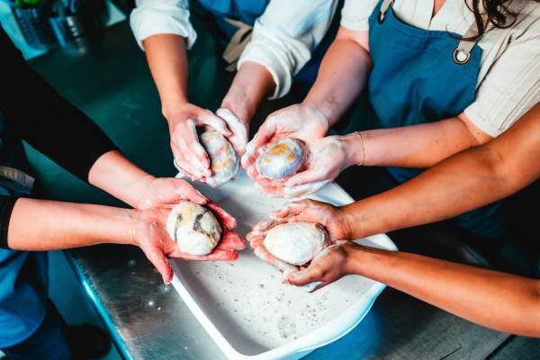 People creating soap souvenirs