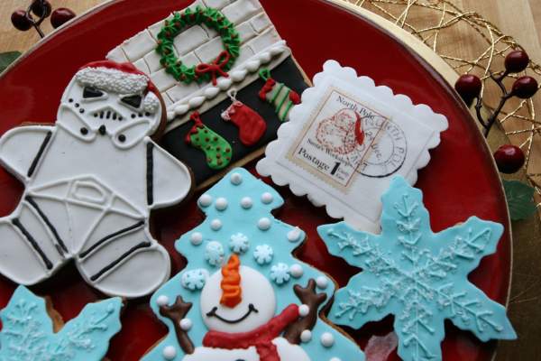 various christmas cookies on a red plate