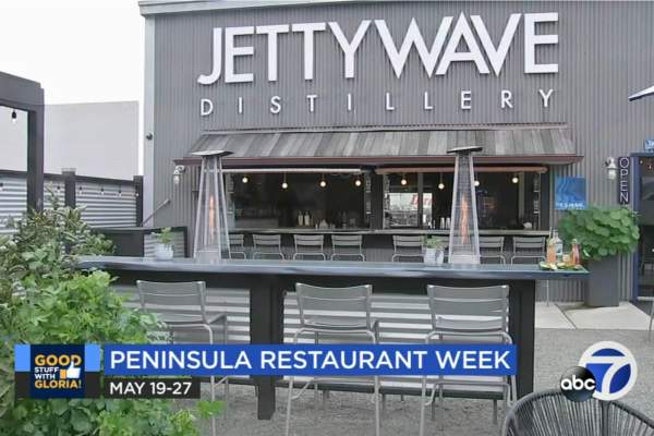 Front of Jettywave Distillery on TV news with ABC7 logo and a banner that reads, "Peninsula Restaurant Week May 19-27"