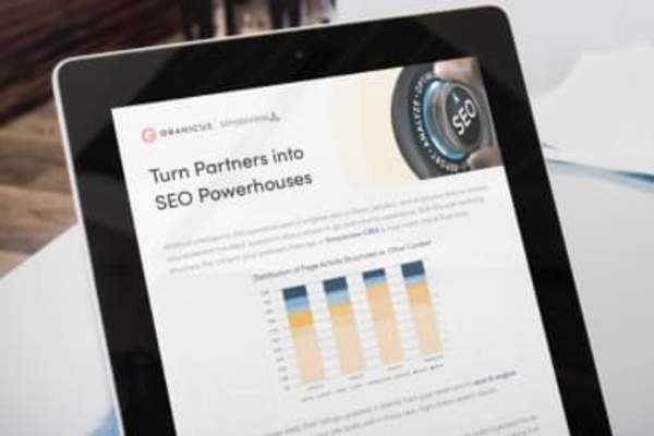 The "Turn partners into SEO powerhouses" cover page open on an iPad.