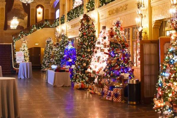 Image shows Embassy lobby decorated for Christmas.