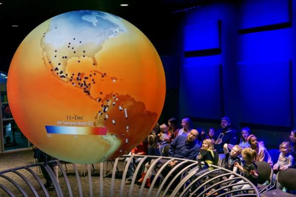 Photos of several exhibits at Science Central.