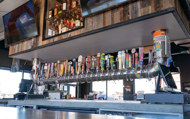 Dog Haus Bar in Cheyenne, Wyoming, featuring an impressive lineup of craft beer on tap, a favorite destination for sports bar fans and nightlife.