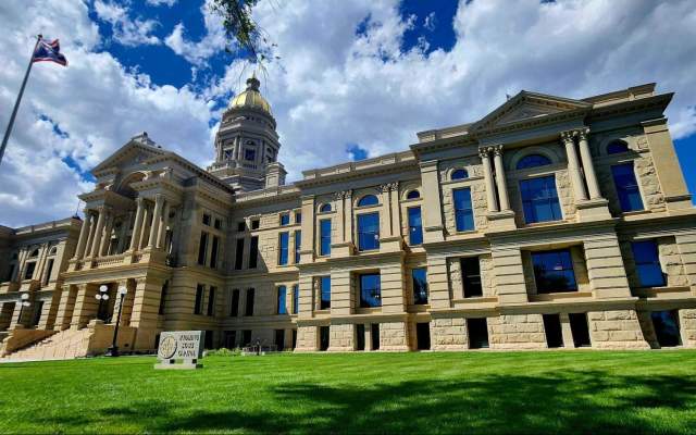 The amazing Wyoming State Capitol Building under a bright blue sky, the best free thing to do with kids in Cheyenne.