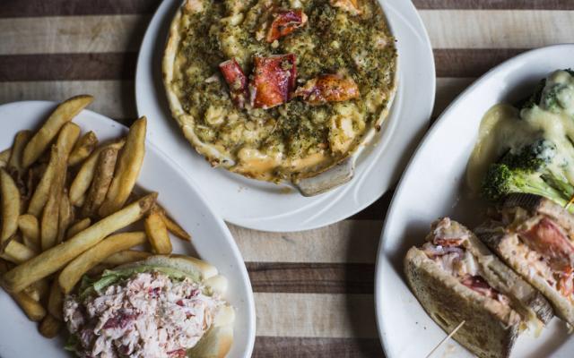Three plates of food on a table