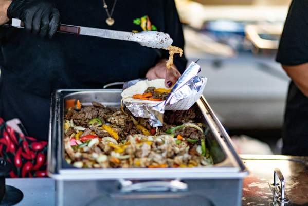 Image of colorful stake fajitas being made for customers at the Cinco De Mayo Celebration