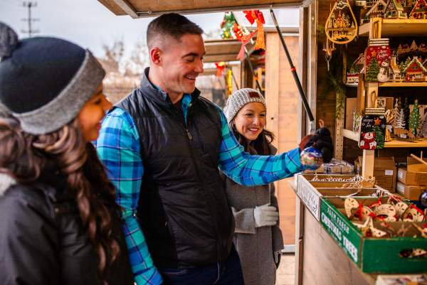Shopping for an ornament at the Wauwatosa Holiday Market